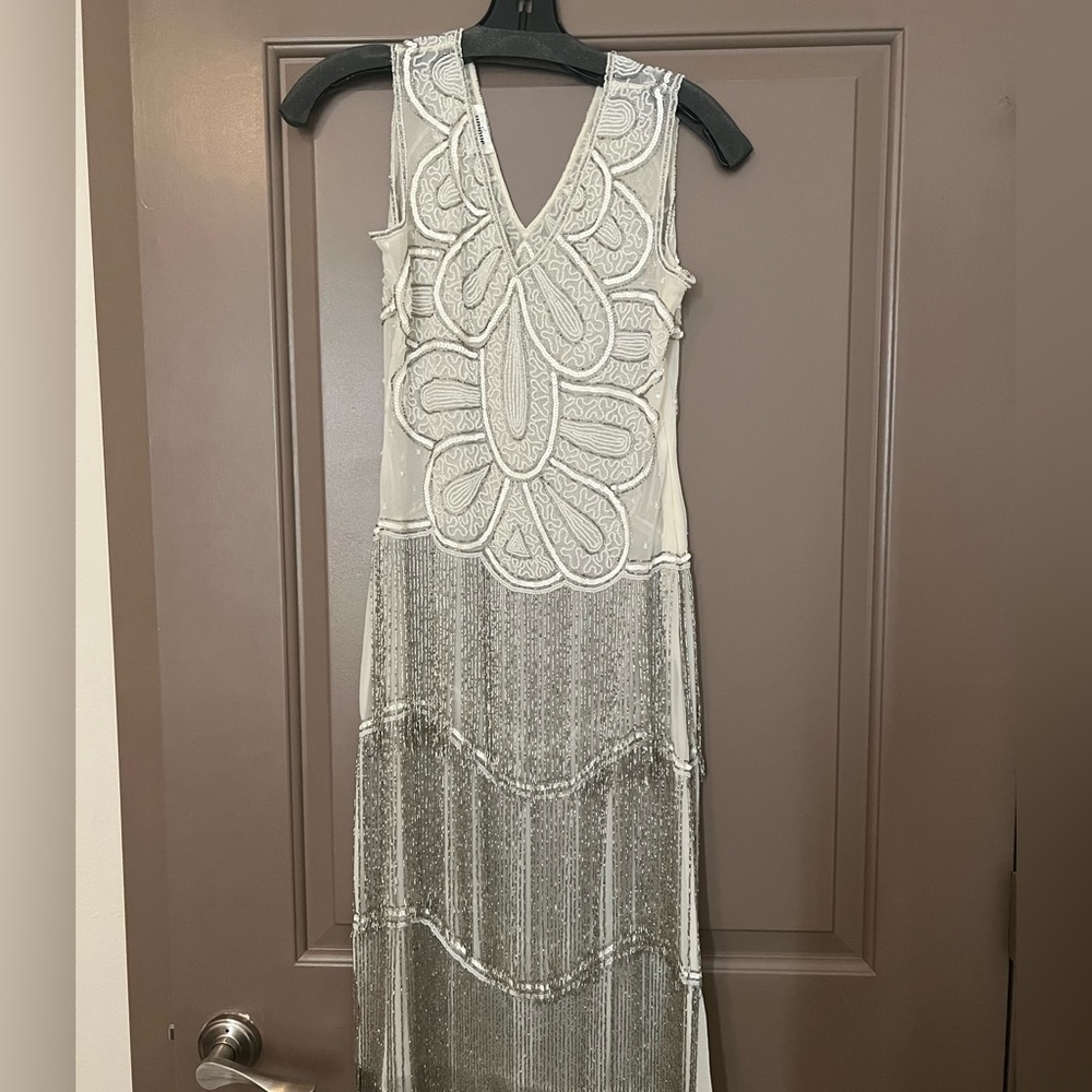 Gorgeous beaded white and silver dress. 1920s style.